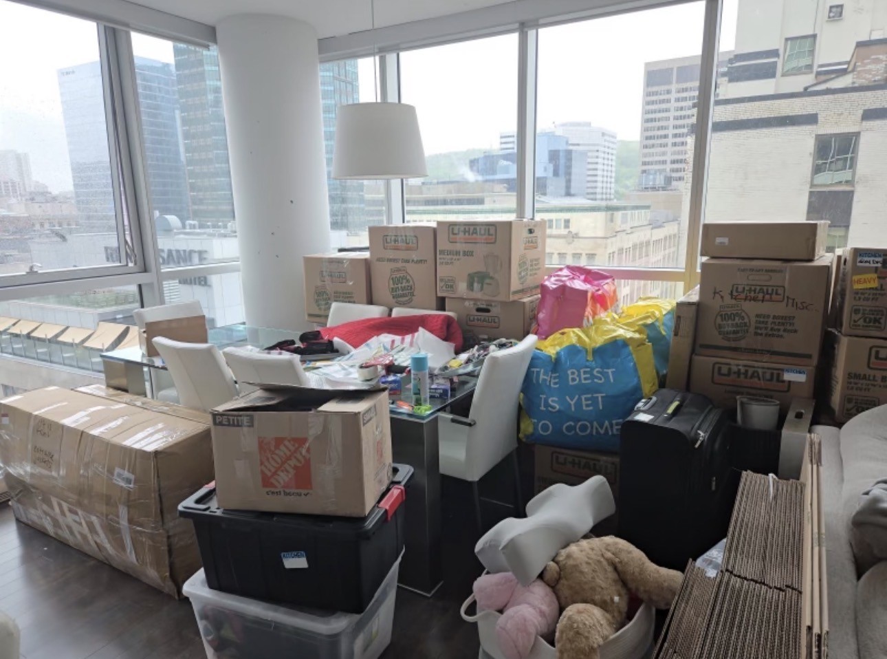 Packing service in progress with labeled Allo Moving boxes
