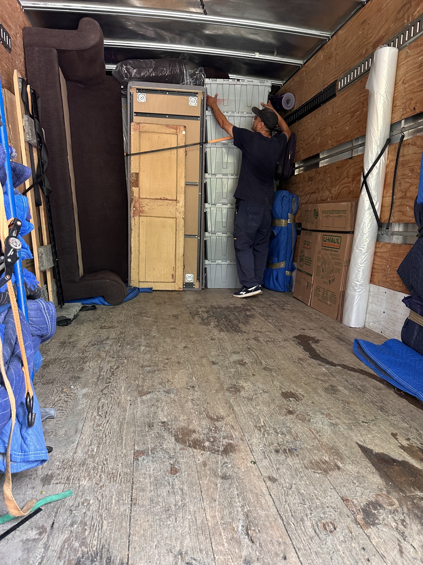 Careful appliance and dresser handling in a Montreal condo